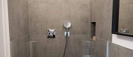 Shower, hair dryer, towels, soap