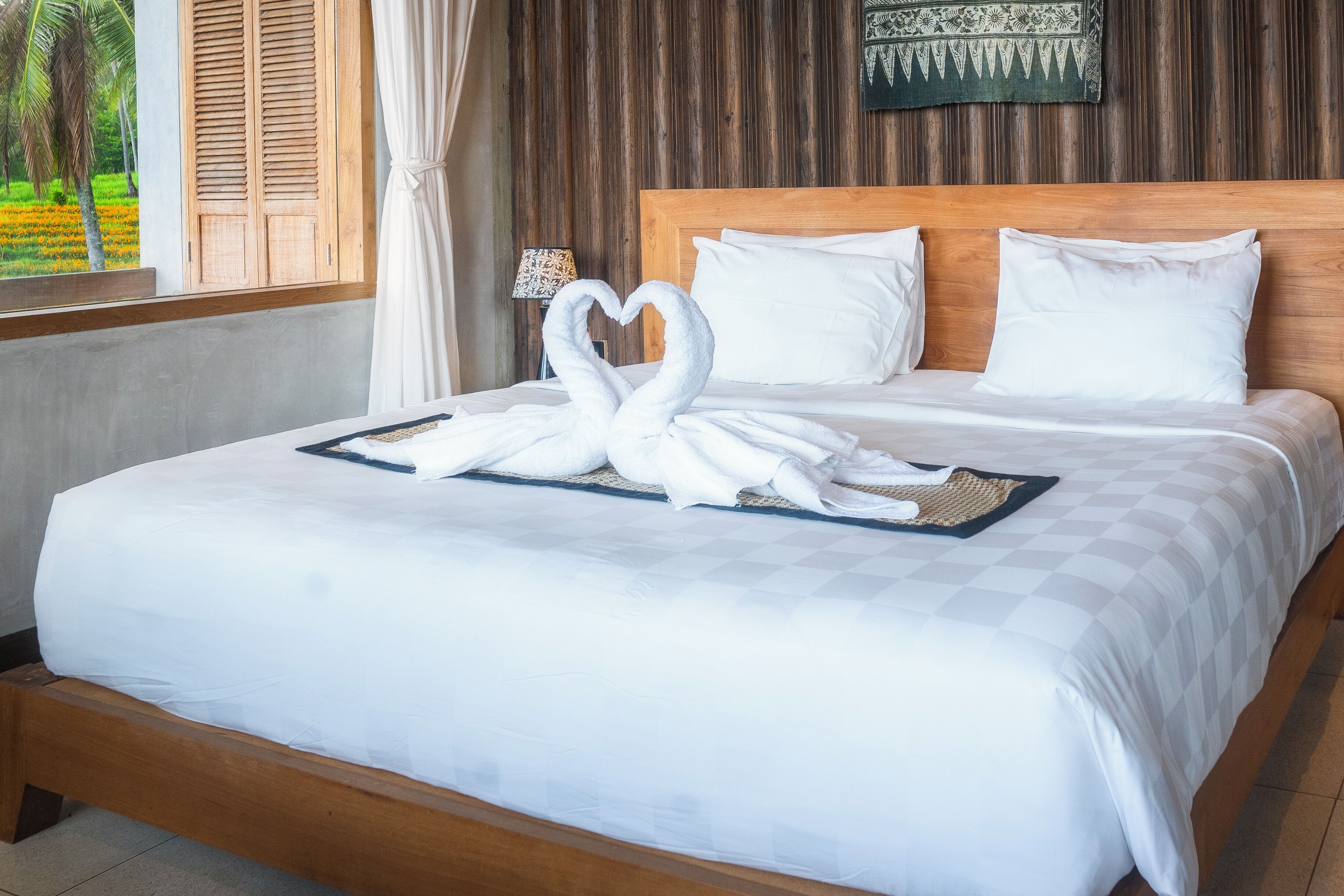 Prana Room | Biancheria da letto di alta qualità, una cassaforte in camera