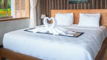 Prana Room | Biancheria da letto di alta qualità, una cassaforte in camera