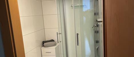 Shower, free toiletries, hair dryer, towels