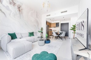 Apartamento Deluxe, balcón | Zona de estar