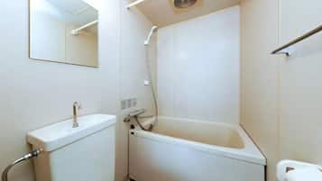 Shower, hair dryer, towels, toilet paper