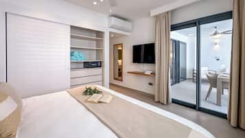 Luxury Apartment, 2 Bedrooms, Partial Ocean View | 2 bedrooms, in-room safe, individually decorated, individually furnished