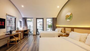 Family Room | Minibar, iron/ironing board, free WiFi, bed sheets