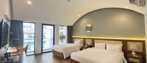 Family Room | Minibar, iron/ironing board, free WiFi, bed sheets