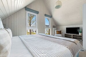 2 bedrooms, travel crib, free WiFi - Holiday home Ankermann I - Infrared sauna, shower, bathtub, fireplace, terrace (Olpenitz)