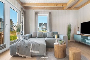 TV, fireplace - Ferienhaus Ankermann I - Infrarot-sauna, Dusche, Badewanne, Kamin, Terrasse (Olpenitz)