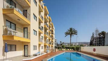 Apartment, 1 Bedroom | Living area | 24-inch flat-screen TV with satellite channels