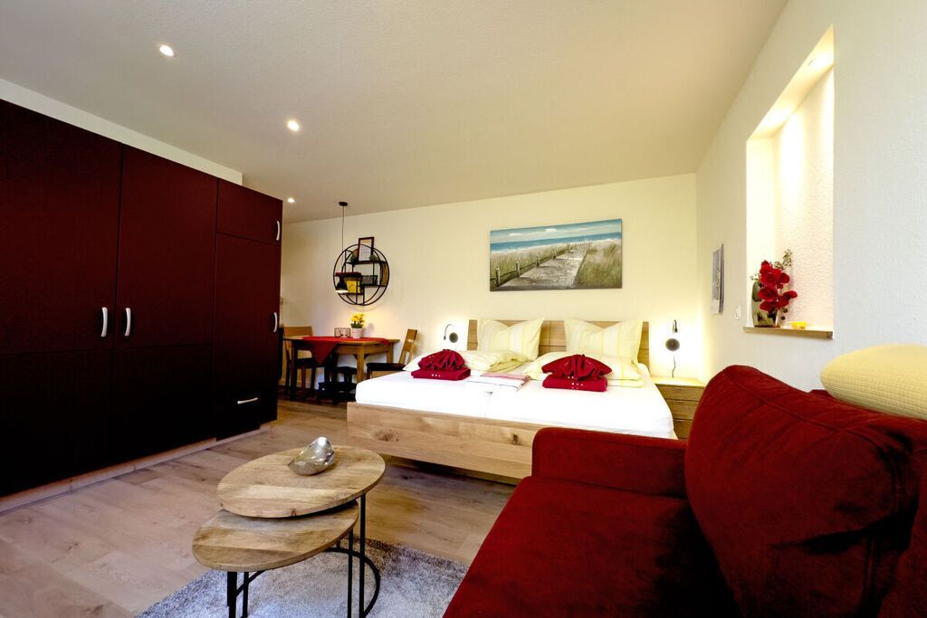 Tabla de planchar con plancha, wifi gratis, ropa de cama