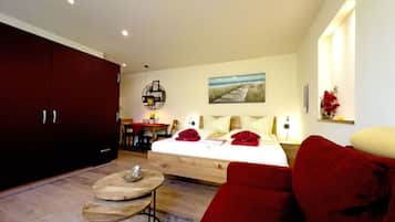 Tabla de planchar con plancha, wifi gratis, ropa de cama