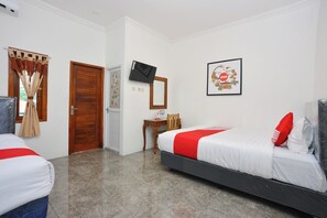 Free WiFi, bed sheets - OYO 634 Elga Sastro Inn Syariah (Yogyakarta)
