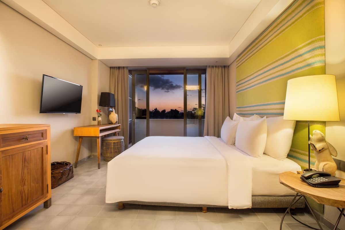 Deluxe Room, Pool View | 1 bedroom, in-room safe, iron/ironing board, free WiFi