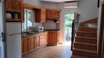 Apartamento clássico, 1 cama de casal e sofá-cama, sacada | Cozinha privada