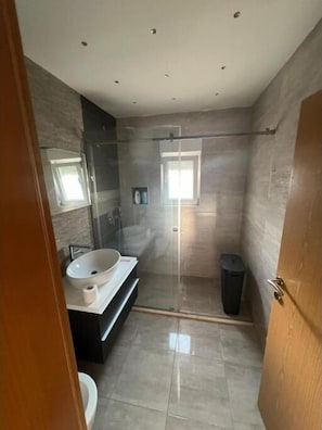 Hair dryer, towels, soap, toilet paper