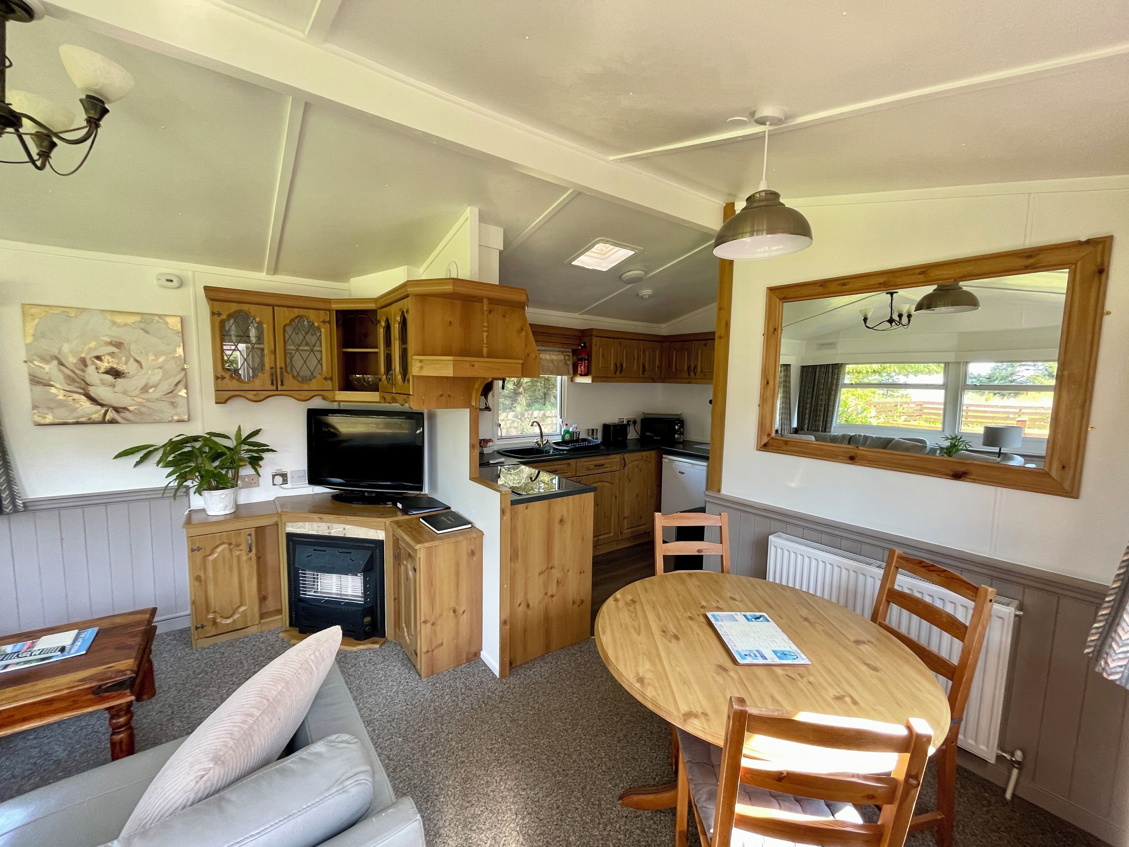 Standard House, 2 Bedrooms, Garden View | Living area | 32-inch flat-screen TV with digital channels, fireplace