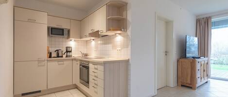 Refrigerador, microondas, horno y parrilla de estufa