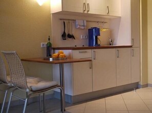 Fridge, stovetop, coffee/tea maker, toaster