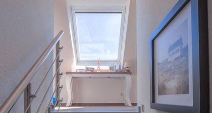 Fischerhaus Classic 318 - Ferienreihenhaus mit Kleinem Garten auf 2 Ebenen