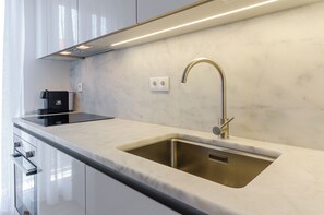 Apartamento, 1 habitación | Cocina privada | Horno, placa de cocina y utensilios de cocina