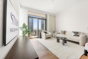 Appartement Deluxe, balcon | Aire de séjour