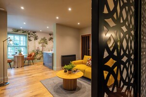 Penthouse | Living area | 65-inch LCD TV with satellite channels, Netflix, Hulu