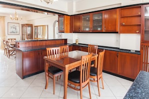 Apartment | Private kitchen | Full-size fridge, microwave, oven, stovetop