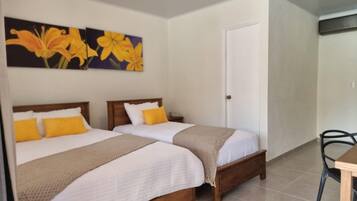 Family Room, Lanai, Pool View | 1 bedroom, in-room safe, desk, laptop workspace