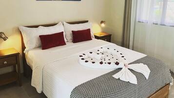 Comfort Suite, Pool View | In-room safe, desk, laptop workspace, free WiFi