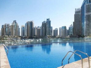 Pool - Sophisticated 2BR Apartment in Cayan Tower, Dubai Marina by Deluxe Holiday Homes (Dubai)