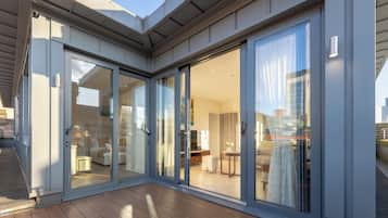 Luxury Penthouse, 3 Bedrooms, City View | Living area | Heated floors