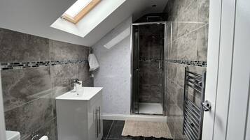 Hair dryer, towels, soap, shampoo