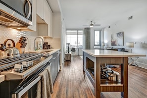 Luxury Apartment, 2 Bedrooms | Private kitchen | Full-size fridge, microwave, oven, stovetop