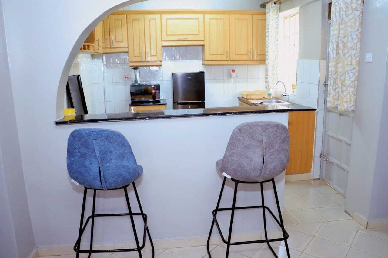 Deluxe Apartment, City View | Private kitchen | Fridge, microwave, cookware/dishes/utensils