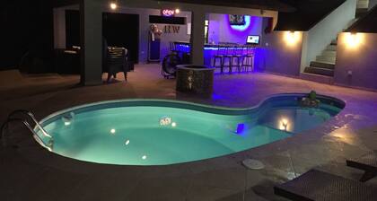 Cozy studio with private Pool and Bar modern amentities perfect for relaxation.