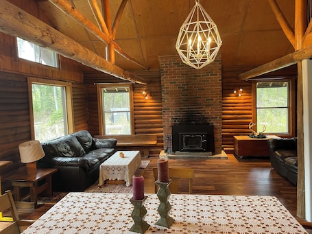 Fireplace. At The River—Modern Cabin Steps from the Beach