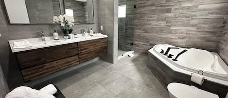 Shower, towels, soap, toilet paper