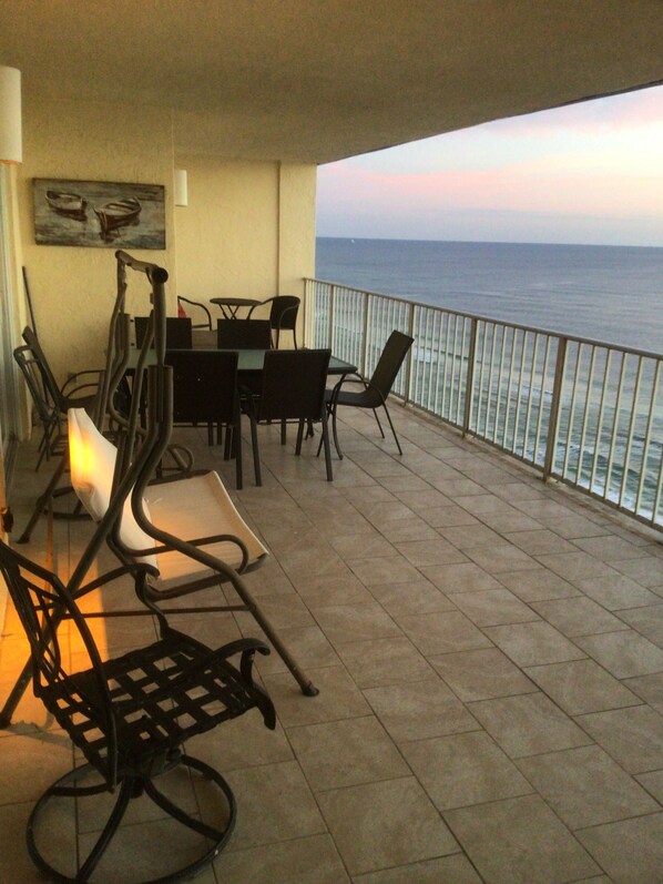 Outdoor dining - Beach Front Penthouse Condo with balcony over looking the Gulf! Family Friendly! (Panama City Beach)