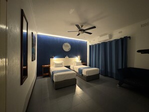 Chambre Deluxe Double ou avec lits jumeaux | 1 chambre, rideaux occultants, fer et planche Ă repasser, Wi-Fi gratuit