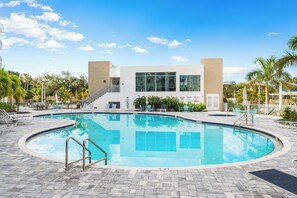 Outdoor pool, a heated pool - Luxurious 2/2 Waterfront CORNER UNIT The Strand w/ 2 balconies (Sarasota)