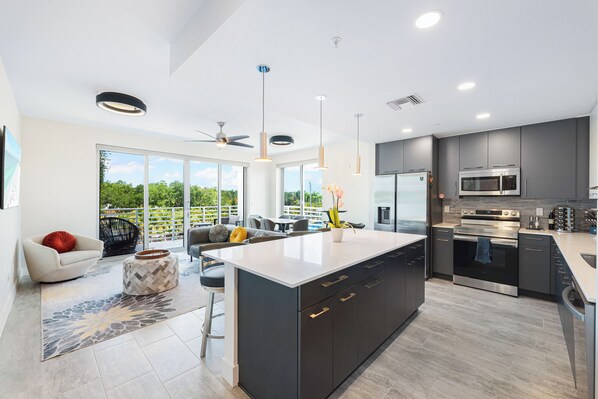 Fridge, microwave, oven, stovetop - Luxurious 2/2 Water View Corner Unit The Strand w/ 2 balconies (Sarasota)