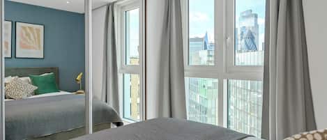 Departamento | 1 habitación, tabla de planchar con plancha, wifi gratis y ropa de cama