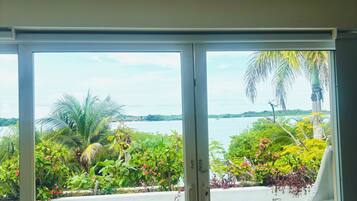 Deluxe Suite, 1 Bedroom, Balcony, Partial Sea View | 1 bedroom, in-room safe