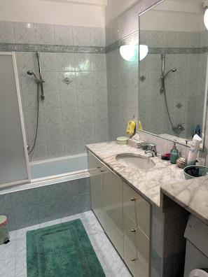 Hair dryer, bidet, towels, soap