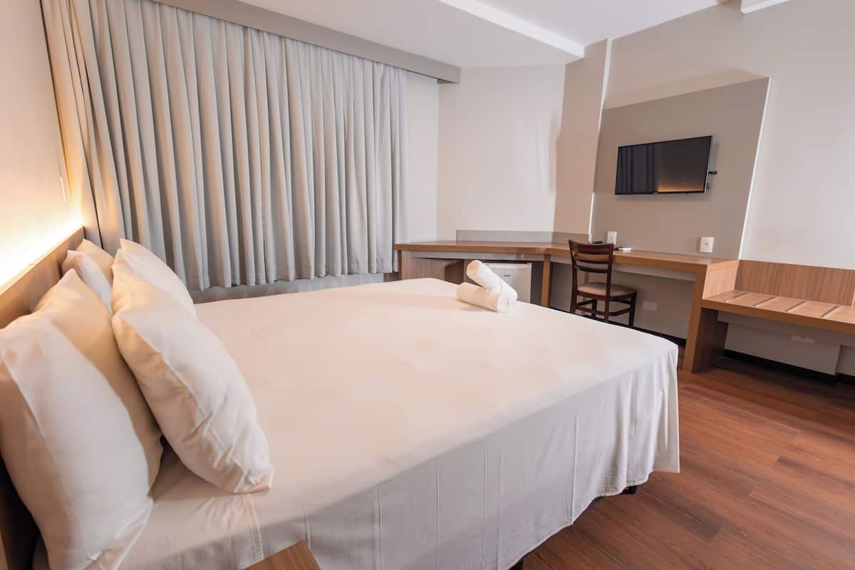 Deluxe Room | In-room safe, blackout drapes, soundproofing, iron/ironing board