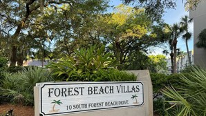A sign for Forest Beach Villas at 10 South Forest Beach Drive. - Exceptional location!  Across the street from the beach! Walk to Everything!  (Hilton Head Island)