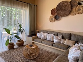 Family Condo | Living area | Flat-screen TV