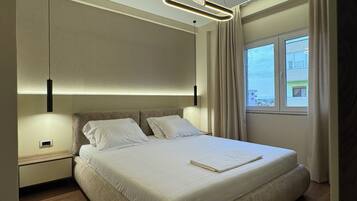 1 habitación, tabla de planchar con plancha, wifi y ropa de cama