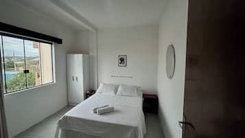 Comfort Quadruple Room, Garden View | Individually furnished, desk, laptop workspace, free WiFi