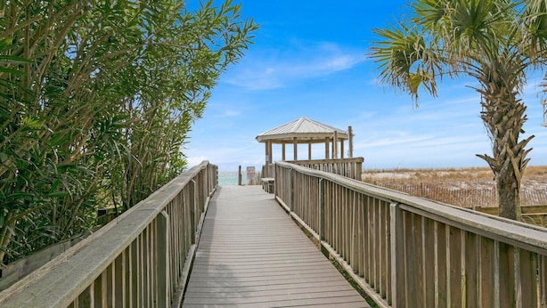 A wooden boardwalk leading to a gazebo with a clear view of the beach and dunes in the distance. - Southbay by the Gulf 34 (Destin)