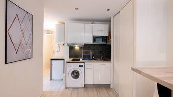 Fridge, microwave, coffee/tea maker, toaster